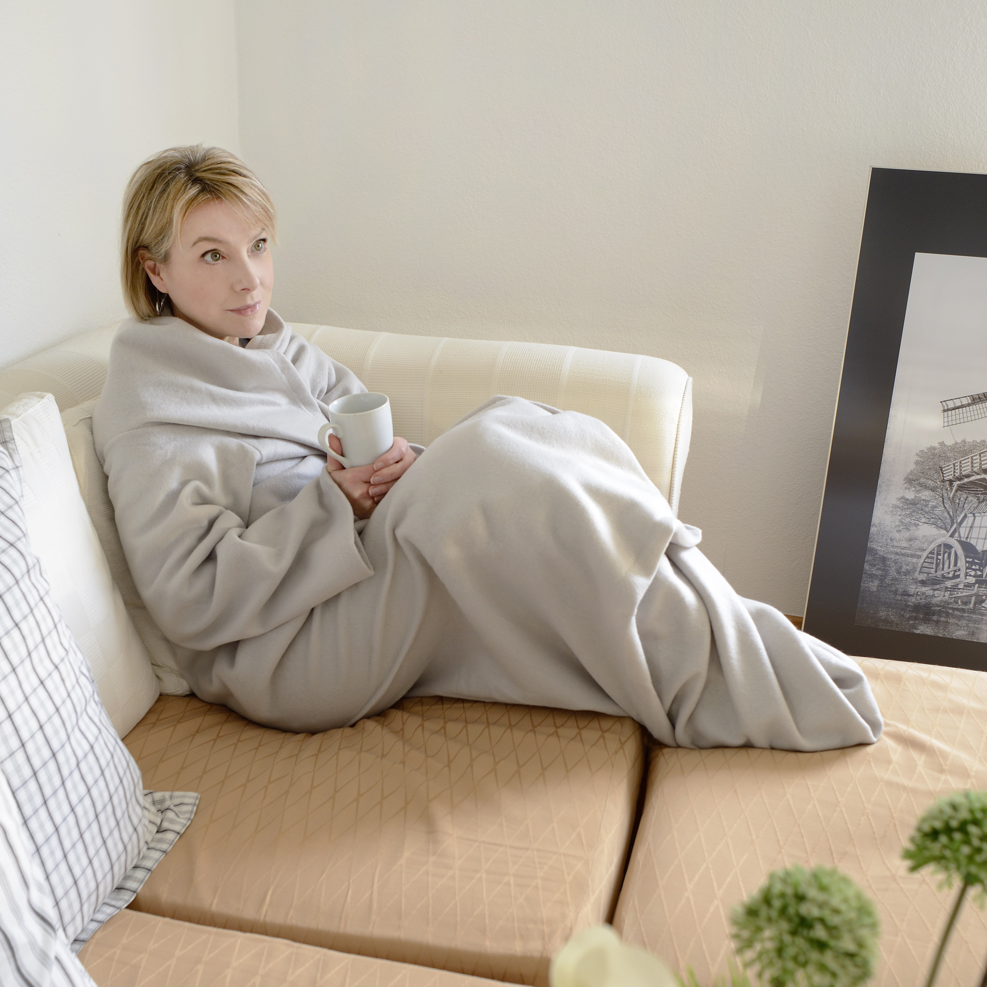 Kuschelige Ärmeldecke beige