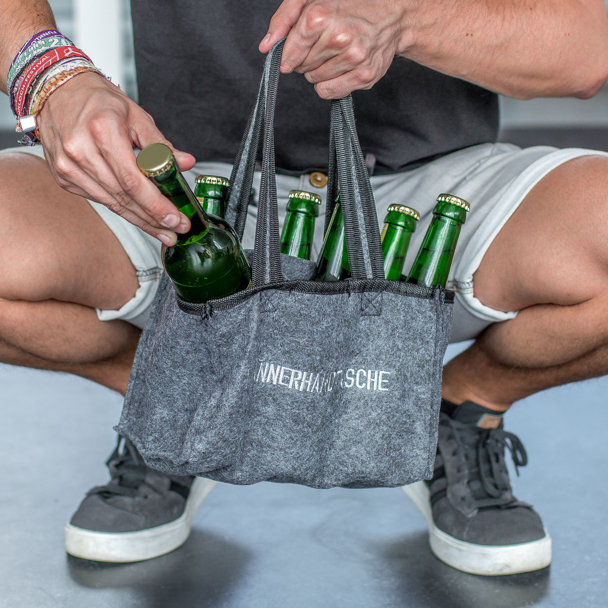 Männerhandtasche für Bier